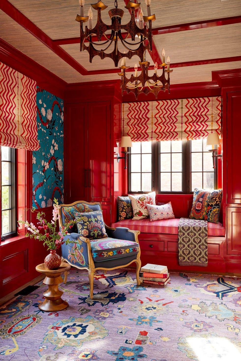 playroom
in the current day playroom,
curtis came up with built in
storage that can later house
servingware if the space is used
as a dining room vinyl wallpaper
custom, brett design
drapery christopher
farr cloth window seat
holland  sherry fabric, with
vintage and jonathan adler
throw pillows side table
herman miller chair and chandeliers
vintage