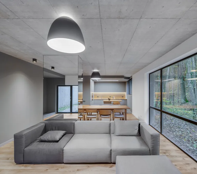 A sofa in light and dark grey tones